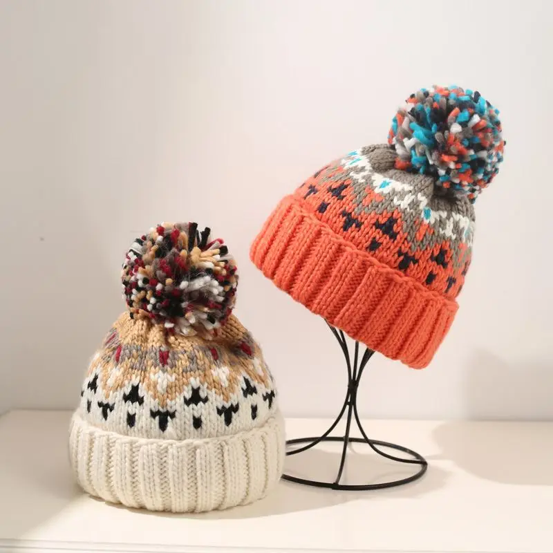 Mütze mit Bommel Damen, gemustert, breiter Umschlag – Bild 3
