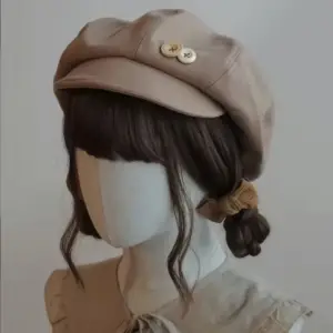 Schiebermütze Beige mit Schirm, Knöpfen und Ballonform – Beige